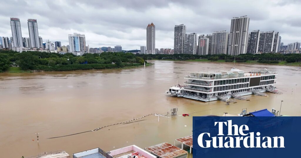Weather tracker: Typhoon leaves people stranded on rooftops in China | China